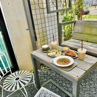 Bean stew with corn bread, harvest panini, coconut passion fruit pastry, tacos, lattes, chai. All were delicious    at The Doshi House Cafe in Houston