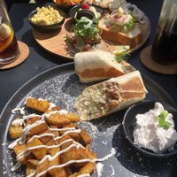 Breakfast burrito and breakfast platter   at VRÜH - All Day Breakfast in Dortmund