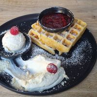 Raspberry waffle with ice cream and whipped cream (all vegan of course) at VRÜH - All Day Breakfast in Dortmund