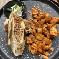 Burrito with vegan meat, vegan egg, vegan sour cream and patatas bravas   at VRÜH - All Day Breakfast in Dortmund