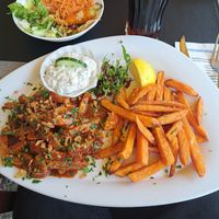 BBQ "Spare Ribs" (Seitan) with sweet potato fries and vegan tzatziki at Restaurant Ethos in Traun