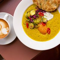 Sri Lankan red lentil dahl with homemade naan, coconut sambal, coconut yoghurt and seasonal vegetables at Oru Space in South East London
