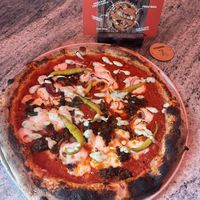 Spiced ‘lamb’ pizza with kale, basil & chimichurri + plant-based mozzarella   at Pizzarova in Bristol