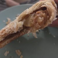 Filling Apple Turnover at The Supreme Dessert Shop in Willingboro