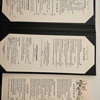Menus with clearly labeled vegan items at 3j's Cafe in Philadelphia