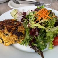 Veggie burger and salad. (Bun isn’t vegan)   at The Mustard Seed in Mount Pleasant