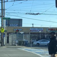 Fenced in parking lot  at ChuMinh Tofu and Veggie Deli in Seattle