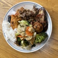 Plate of assorted food from buffet including tofu skins, veggies, and eggplant   at ChuMinh Tofu and Veggie Deli in Seattle