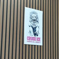 CRUSH ICE poster on the wall  at ChuMinh Tofu and Veggie Deli in Seattle