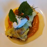 Savoy cabbage wrapped with oyster mushrooms, OMG, plus decadent sauces at Miss Rachel's Pantry in Philadelphia