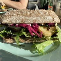 Sandwich with potatoes, red cabbage, parsley pesto and dressing with herbs - so tasty 😋  at The Break Cafe in Thisted