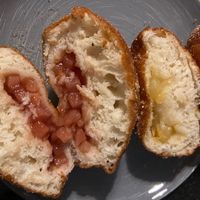 Appelbol (left) and perenbol (right) at Oliebollen Utrecht Neude in Utrecht