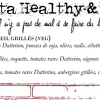 Vegan salad options (grilled vegetables and a poke bowl) at The Village Terrazza in Paris