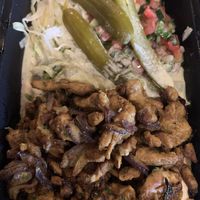 Vegan Shawarma over hummus with pickles and cabbage   at Marcel Bakery & Kitchen in Montclair