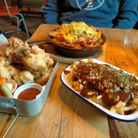 Nachos, cauliflower bites and poutine at The World Bar and Resturant in Queenstown