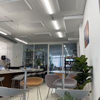 Interior with ceramic studio view in the back of the cafe  at Dune in Rotterdam