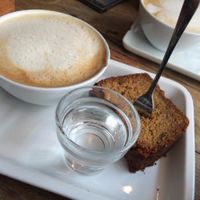 delicious slice with coffee  at Deli Kitchen in Munich