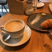 vegan croissant and cappuccino  at Deli Kitchen in Munich