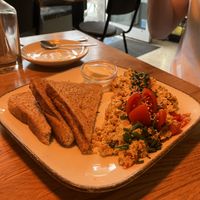 scrambled tofu, bread and vegan butter  at Deli Kitchen in Munich