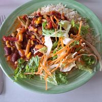 colourful bean chilli additional long grain rice and marinated leaf salads at Mensa UniCampus Magdeburg in Magdeburg