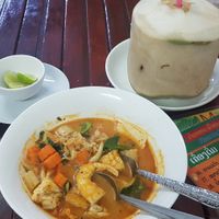 Tom Yum Soup 40k Kip, Coconut 30k Kip at Kaun Im Yok Vegan Restaurant - H&H in Vang Vieng