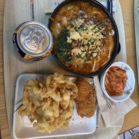 tantan mushroom, karage, sweet potato tempura, kimchi  at Marugame Udon - Oxford Circus in London