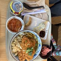 pumpkin katsu udon, gyoza, sprouts tempura, kimchi  at Marugame Udon - Oxford Circus in London