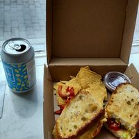 Harissa sandwich with grilled pepper and vegan cheddar + ginger and lemon kombucha at The Wandering Elk in Portlaoise