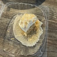 (eaten) coconut cupcake — delicious   at Sipz Fusion Cafe - Clairemont Mesa in San Diego