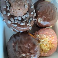 Boston Cream x2  PawPaw Brownie Batter all vegan at Starlight Doughnut Lab in Norwood