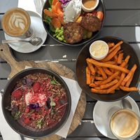 Coffees, sweet potato chips (subbed for vegan mayo), rhubarb crumble  at Fourth Chapter in Prahran