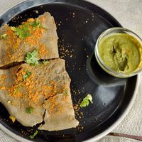 Barnyard Millet Dosa, filled with spiced potato, served with green chutney & coconut ghee podi at Cafe Graze - Plant Based Kitchen by Natureville in Bangalore