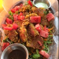 dragon burger over sprouted greens  at Mother Earth Sanctuary Cafe in Lake Worth