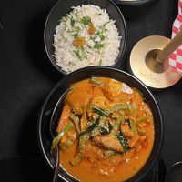 Curries served with ricee  at Delhi6 Indian Kitchen in Highland Village