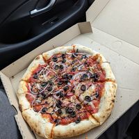 Veggie pizza with olives at Dolce Pizza in Lake Tekapo
