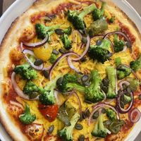 Brokkoli Pizza with vegan cheese   at Abaton Bistro in Hamburg