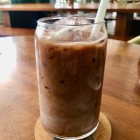 Cocoa-chaga iced oat milk latte at New Earth Cafe in Dubai