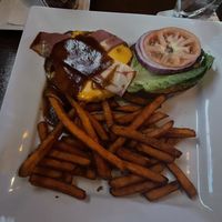 Bbq “chicken” sandwich & sweet potato fries   at Mercury Bar West in New York City