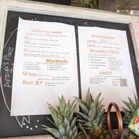 Drink menu up on the wall at Araya's Place in Bellevue
