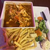 Veggies in tomato sauce (sauce was a bit too thin but with the rice it was ok)  at Swings Restaurant & Bar in San Pedro