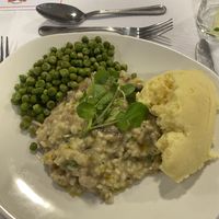 Mushroom risotto with mashed potato and peas  at Leyton Orient FC in East London