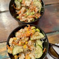 Build your own Poke bowls w/ sesame & coconut on top  at Nalú Comida Inteligente in Samara