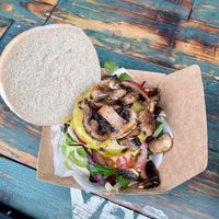 Burger with mushrooms and salad.  at Vegazmo in Tynemouth
