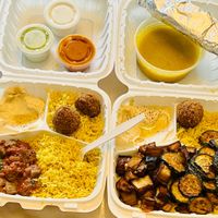 Some kind of tomato based stew with okra.

Vegetarian plate with added Lentil Soup at Kismet Cafe in Austin