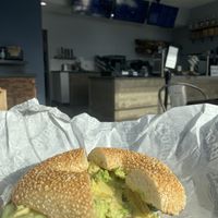Sesame bagel with vegan chive cream cheese, avocado, cucumber, and mushrooms  at Providence Bagel in Attleboro
