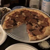 Vegan pepperoni pizza with veggies, brussel sprouts and we didn’t even get to the salad yet!  at Sky High Pie in Joshua Tree