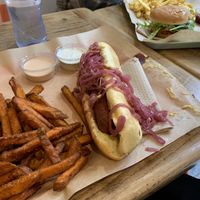 Hot and sweet Dog with sweet potato fries. Junior Cheese Burger in the back.  at Vbb House in Paris