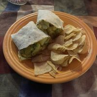 The tofu curry burrito and chips   at The Zenith in Pittsburgh