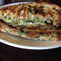 Pan seared seitan with roasted veges and pesto at New Moon VT in Burlington