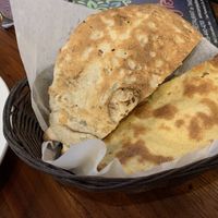 Tandoori Roti (bottom bread).  at Curry Leaf in San Francisco